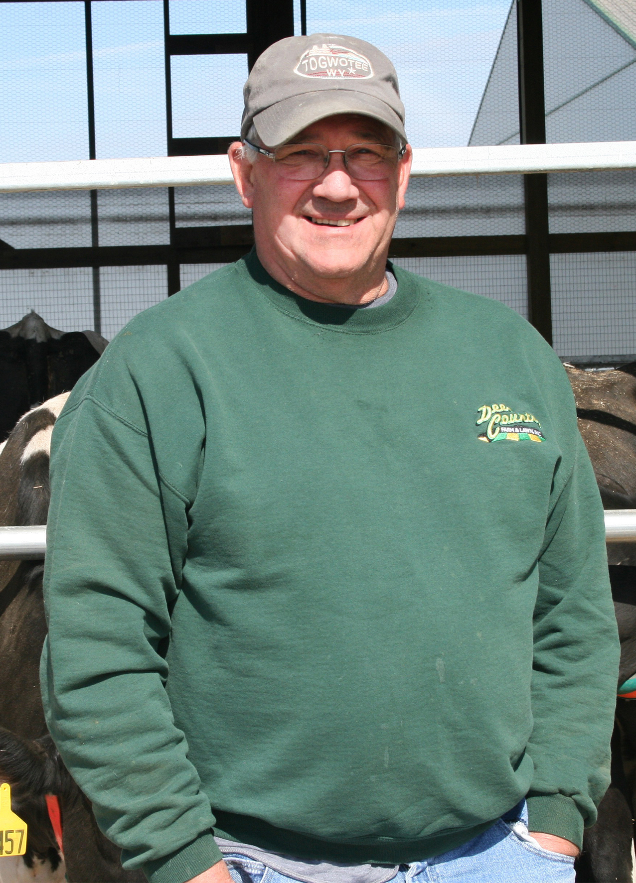 Green sweatshirt smiling